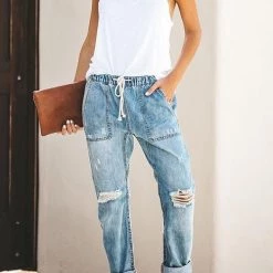 Levency Broken Hole Pockets Knot Jeans New In