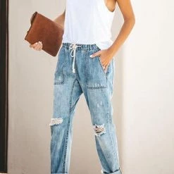 Levency Broken Hole Pockets Knot Jeans New In