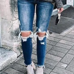 Levency Broken Hole Mid Waist Jeans New In