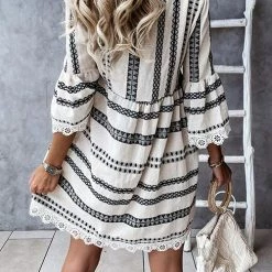 Levency New In Print Lace Hem V Neck Mini Dress