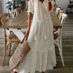 Levency Eyelet Tassels Tiered Maxi Dress