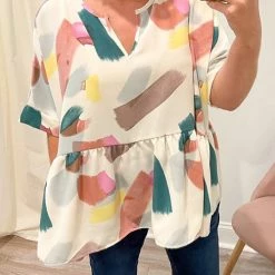 Levency Print Cuffed Sleeves Peplum Blouse