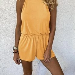 Levency Solid Sleeveless Open Back Romper New In