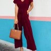 Levency New In Solid Pockets V Neck Belted Jumpsuits