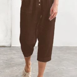 Levency Button Pockets Tapered Leg Pants New In