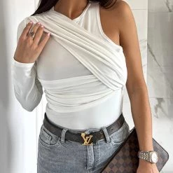 Levency Spirit Irregular Sleeves Twist Top New In