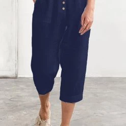 Levency Button Pockets Tapered Leg Pants New In