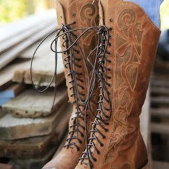 Levency Laser Cut Lace Up High Boot