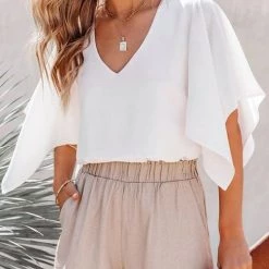 Levency New In Solid V Neck Bat Blouse