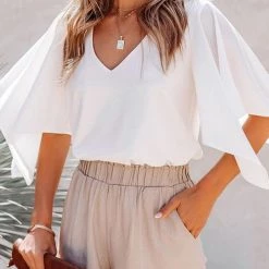 Levency New In Solid V Neck Bat Blouse